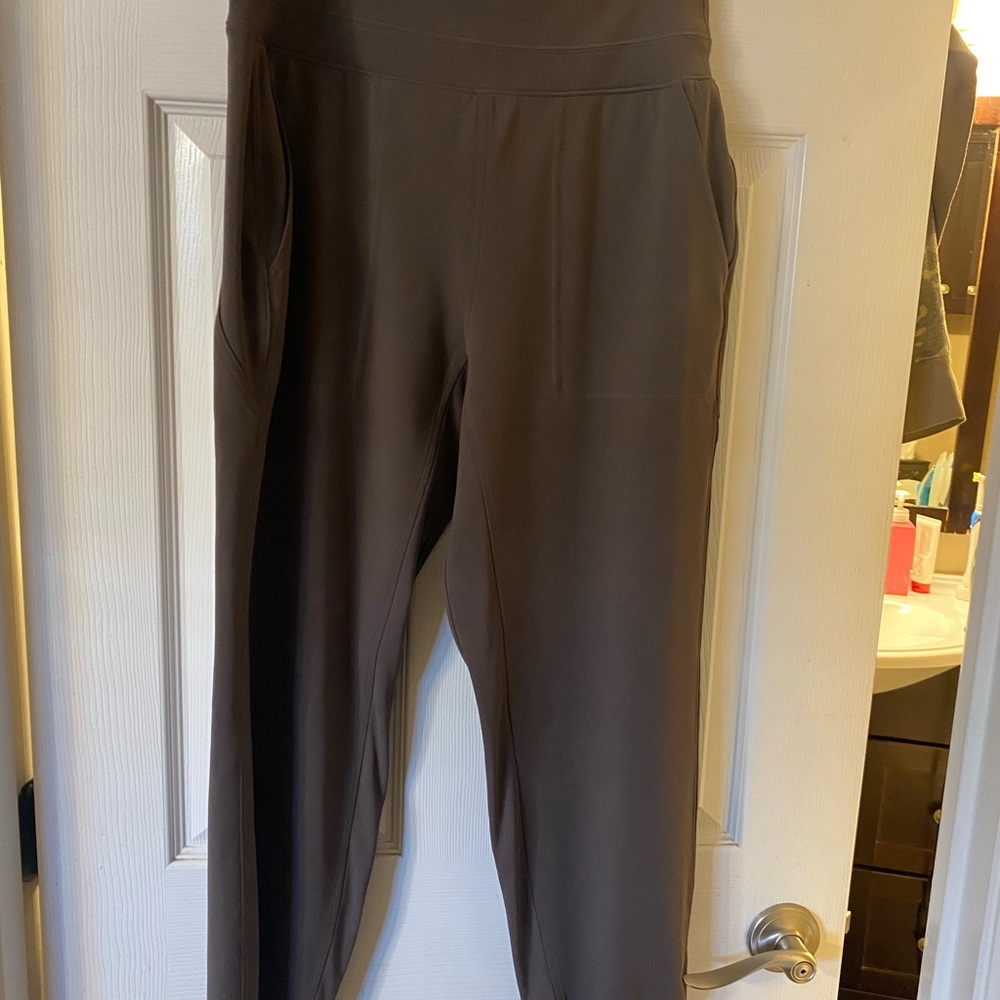 Cute jogger. 70% Nylon and 20% spandex. Matching hoodie is listed